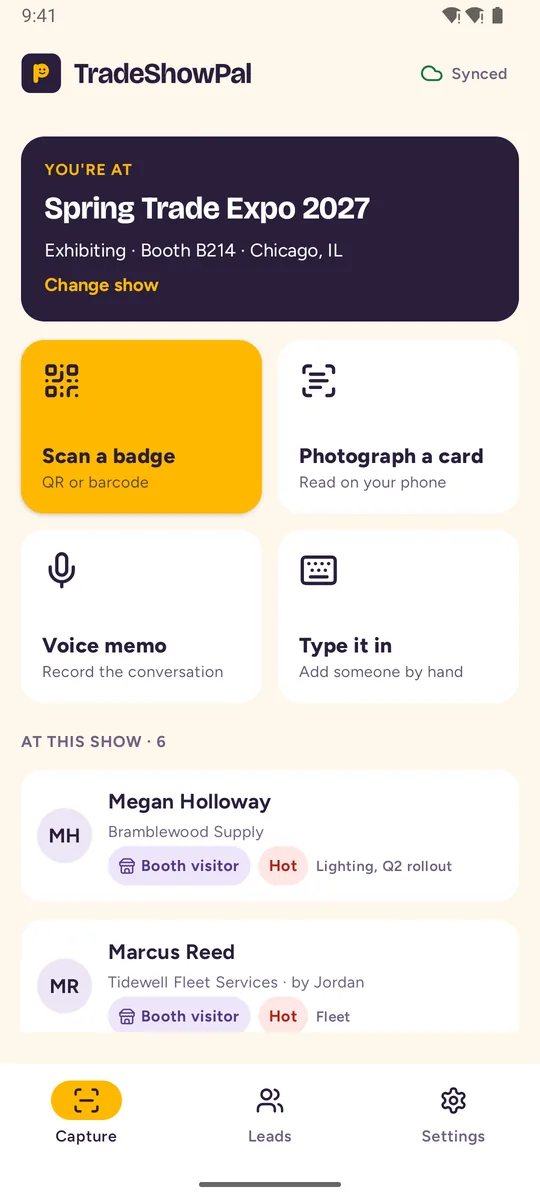The app home screen: the show you are at, and buttons to scan a badge, photograph a card, record a voice memo or type someone in
